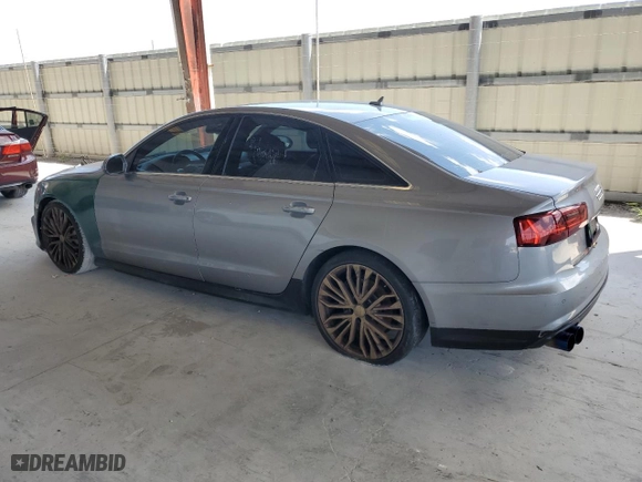 2016 Audi A6 2.0T Premium Plus with VIN WAUGFAFC4GN048745, listed as a Copart auction lot 52599295 with 105,925 mi miles and Clean Title. Bid and sale history available at carsss.com. Image 2.