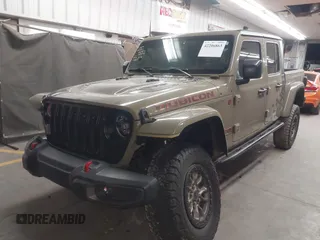 2020 Jeep Gladiator Rubicon z VIN 1C6JJTBGXLL178893, wystawiony jako IAAI lot #42206863 z przebiegiem 29 138 mil mil oraz . Historia ofert i sprzedaży dostępna na DreamBid. Obrazek 2.