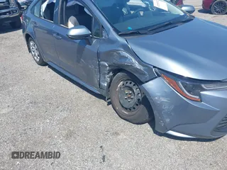 2023 Toyota Corolla LE z VIN JTDB4MEE7PJ002731, wystawiony jako IAAI lot #42155242 z przebiegiem 53 394 mil mil oraz . Historia ofert i sprzedaży dostępna na DreamBid. Obrazek 6.