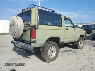 1987 Ford Bronco z VIN 1FMCU14T6HUC98971, wystawiony jako Copart lot #69262784 z przebiegiem 49 522 mil mil oraz Czysty tytuł • Clean title. Historia ofert i sprzedaży dostępna na DreamBid. Obrazek 3.