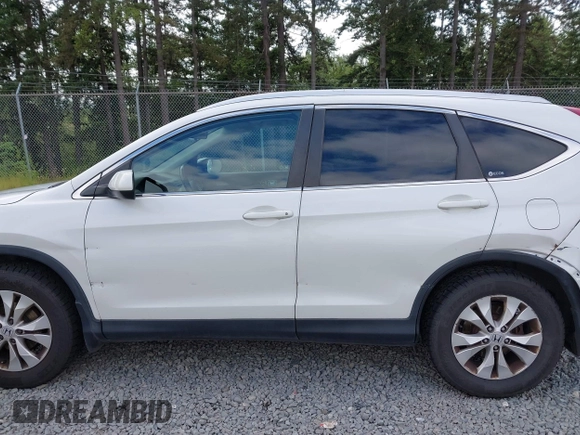 2012 Honda CR-V EX-L with VIN 5J6RM4H75CL081031, listed as a IAAI auction lot 42353331 with 203,769 mi miles and . Bid and sale history available at DreamBid. Image 14.