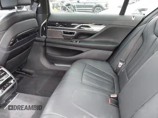 2019 BMW 7 Series 740i with VIN WBA7E2C57KB217973, listed as a IAAI auction lot 39064321 with 54,818 mi miles and . Bid and sale history available at DreamBid. Image 8.