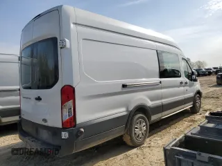 2017 Ford Transit with VIN 1FTYR3XG9HKB12597, listed as a Copart auction lot 52020935 with 281,009 mi miles and Salvage title. Bid and sale history available at DreamBid. Image 3.