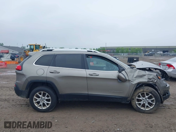 2017 Jeep Cherokee Latitude with VIN 1C4PJMCB3HW657318, listed as a IAAI auction lot 42429044 with 133,335 mi miles and . Bid and sale history available at DreamBid. Image 13.