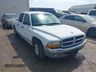2002 Dodge Dakota SLT z VIN 1B7HL48N42S536281, wystawiony jako IAAI lot #41715600 z przebiegiem 104 562 mil mil oraz . Historia ofert i sprzedaży dostępna na DreamBid. Obrazek 1.