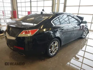 2009 Acura TL Tech with VIN 19UUA86549A010863, listed as a IAAI auction lot 41001252 with 186,441 mi miles. Bid and sale history available at carsss.com. Image 4.