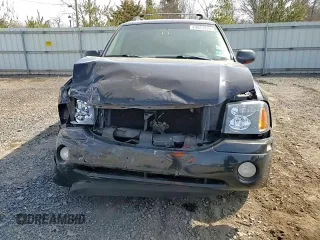 2003 GMC Envoy SLT z VIN 1GKET16PX36243554, wystawiony jako Copart lot #49083975 z przebiegiem 148 596 mil mil oraz Szkoda całkowita • Salvage title. Historia ofert i sprzedaży dostępna na DreamBid. Obrazek 11.