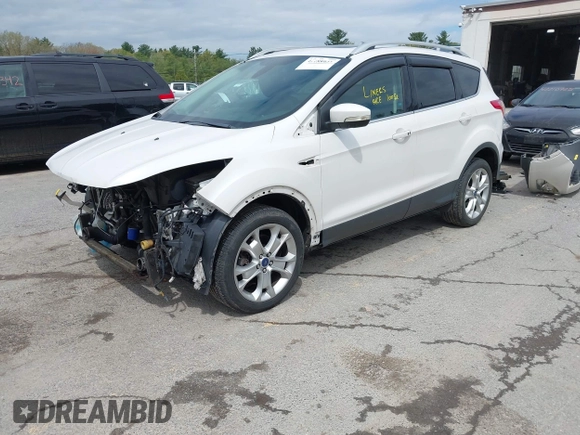 2016 Ford Escape Titanium with VIN 1FMCU9J98GUA00832, listed as a IAAI auction lot 42188941 with 90,764 mi miles and . Bid and sale history available at DreamBid. Image 17.