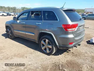 2012 Jeep Grand Cherokee Overland with VIN 1C4RJECT7CC105614, listed as a IAAI auction lot 41629174 with 264,756 mi miles. Bid and sale history available at carsss.com. Image 3.