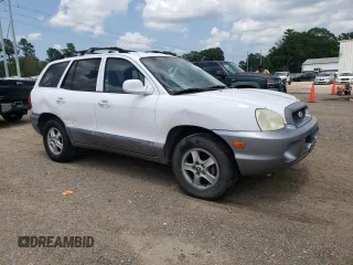 2004 Hyundai Santa Fe z VIN KM8SB12B04U640985, wystawiony jako Copart lot #56584595 z przebiegiem 239 527 mil mil oraz Szkoda całkowita • Salvage title. Historia ofert i sprzedaży dostępna na DreamBid. Obrazek 4.