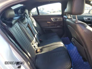 2015 Jaguar XF V6 Portfolio with VIN SAJWA0F7XF8U51105, listed as a Copart auction lot 82865814 with 62,807 mi miles and Salvage Title. Bid and sale history available at carsss.com. Image 10.