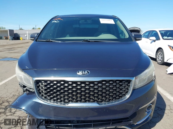 2016 Kia Sedona SX-L with VIN KNDME5C15G6083811, listed as a IAAI auction lot 41932863 with 124,218 mi miles. Bid and sale history available at carsss.com. Image 12.