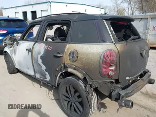 2014 MINI Countryman S with VIN WMWZC3C55EWT00416, listed as a IAAI auction lot 42031870 with Not Provided miles and . Bid and sale history available at DreamBid. Image 3.