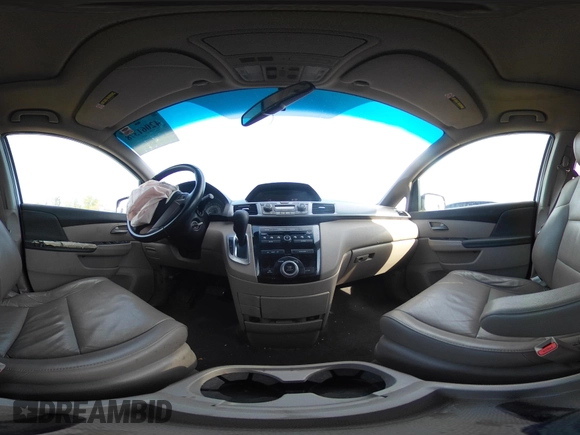 2011 Honda Odyssey EX-L with VIN 5FNRL5H6XBB059162, listed as a IAAI auction lot 42061378 with 164,317 mi miles and . Bid and sale history available at carsss.com. Image 20.