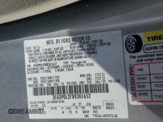2011 Ford Fusion Hybrid with VIN 3FADP0L37BR301652, listed as a Copart auction lot 55696495 with 152,677 mi miles and Salvage title. Bid and sale history available at DreamBid. Image 12.