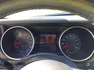 2019 Ford Mustang EcoBoost z VIN 1FATP8UHXK5205196, wystawiony jako IAAI lot #41688651 z przebiegiem 75 642 mil mil oraz . Historia ofert i sprzedaży dostępna na DreamBid. Obrazek 7.