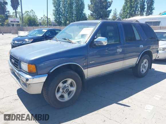 1996 Isuzu Rodeo z VIN 4S2CM58V6T4310394, wystawiony jako IAAI lot #42215009 z przebiegiem 244 151 mil mil oraz . Historia ofert i sprzedaży dostępna na DreamBid. Obrazek 2.