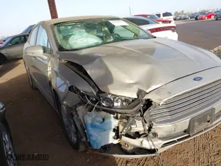 2015 Ford Fusion SE Hybrid with VIN 3FA6P0LU2FR156205, listed as a IAAI auction lot 41533507 with 98,693 mi miles. Bid and sale history available at carsss.com. Image 6.