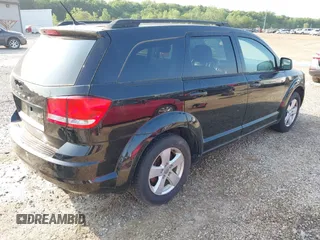 2013 Dodge Journey SE with VIN 3C4PDCAB9DT561701, listed as a IAAI auction lot 42403322 with 143,766 mi miles and . Bid and sale history available at DreamBid. Image 4.