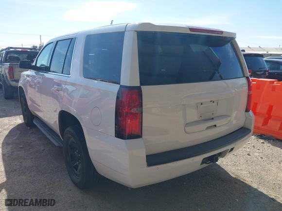 2018 Chevrolet Tahoe Commercial with VIN 1GNLCDEC0JR283440, listed as a IAAI auction lot 41280493 with 241,531 mi miles. Bid and sale history available at carsss.com. Image 3.