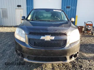 2012 Chevrolet Orlando 1LT z VIN KL77P2EM7CK572173, wystawiony jako Copart lot #76684924 z przebiegiem 211 680 mil mil oraz Tytuł czysty. Historia ofert i sprzedaży dostępna na DreamBid. Obrazek 5.