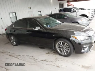 2023 Infiniti Q50 Luxe with VIN JN1EV7BPXPM512588, listed as a IAAI auction lot 41819661 with 30,817 mi miles and . Bid and sale history available at DreamBid. Image 13.