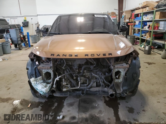2014 Land Rover Range Rover Evoque Dynamic с VIN SALVT2BG6EH870050, выставлен на аукционе Copart как лот 42452995 с пробегом 126 143 миль миль и Списание • Salvage title. История ставок и продаж доступна на DreamBid. Изображение 5.