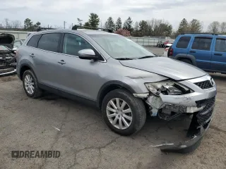 2010 Mazda CX-9 Grand Touring z VIN JM3TB3MV5A0210214, wystawiony jako Copart lot #51251585 z przebiegiem 138 885 mil mil oraz Szkoda całkowita • Salvage title. Historia ofert i sprzedaży dostępna na DreamBid. Obrazek 4.