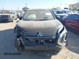 2022 Mitsubishi Outlander ES z VIN JA4J3TA89NZ054377, wystawiony jako IAAI lot #41747069 z przebiegiem 50 263 mil mil oraz . Historia ofert i sprzedaży dostępna na DreamBid. Obrazek 11.