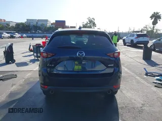 2019 Mazda CX-5 Touring with VIN JM3KFACM7K1534905, listed as a IAAI auction lot 41945607 with 56,014 mi miles. Bid and sale history available at carsss.com. Image 17.