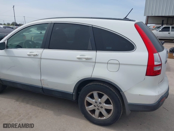 2009 Honda CR-V EX-L with VIN JHLRE38729C013942, listed as a IAAI auction lot 41732770 with 222,099 mi miles. Bid and sale history available at carsss.com. Image 6.
