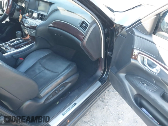 2015 Infiniti Q70 with VIN JN1BY1AR6FM560209, listed as a IAAI auction lot 41703926 with 117,503 mi miles and . Bid and sale history available at DreamBid. Image 5.