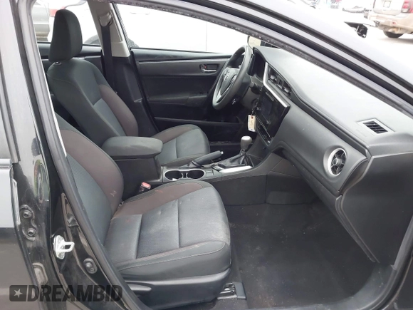 2019 Toyota Corolla L with VIN 5YFBURHE5KP945925, listed as a IAAI auction lot 41493079 with 96,849 mi miles and . Bid and sale history available at carsss.com. Image 5.