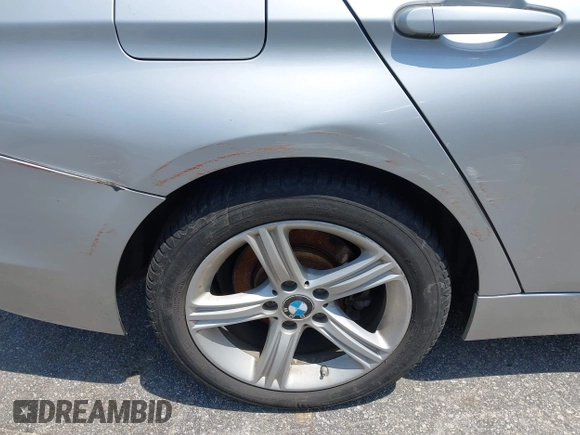 2013 BMW 3 Series 328i xDrive with VIN WBA3B3C52DJ975970, listed as a IAAI auction lot 42280624 with 2,262,225 mi miles and . Bid and sale history available at DreamBid. Image 6.