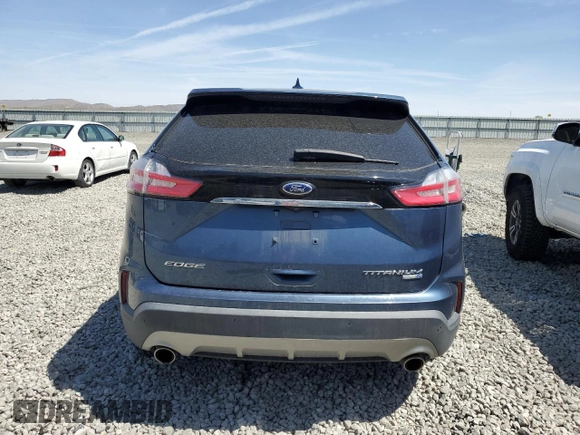 2019 Ford Edge Titanium z VIN 2FMPK4K91KBB81098, wystawiony jako Copart lot #53604115 z przebiegiem 70 179 mil mil oraz Szkoda całkowita • Salvage title. Historia ofert i sprzedaży dostępna na DreamBid. Obrazek 6.