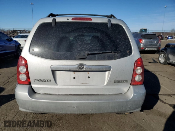 2006 Mazda Tribute S with VIN 4F2YZ04166KM17017, listed as a Copart auction lot 42969365 with 217,984 mi miles and Salvage Title. Bid and sale history available at DreamBid. Image 6.