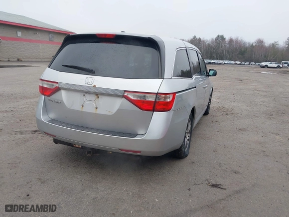 2011 Honda Odyssey EX-L with VIN 5FNRL5H65BB047291, listed as a IAAI auction lot 42094374 with 200,372 mi miles. Bid and sale history available at carsss.com. Image 4.