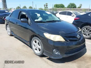 2011 Toyota Corolla L with VIN 2T1BU4EE4BC653514, listed as a IAAI auction lot 42087845 with 169,985 mi miles. Bid and sale history available at carsss.com. Image 1.