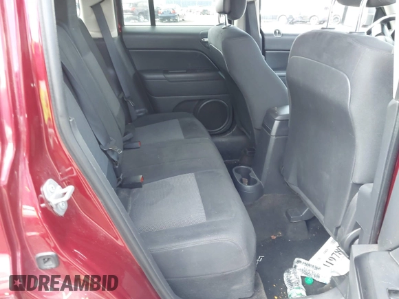 2014 Jeep Patriot Latitude with VIN 1C4NJRFB4ED897890, listed as a IAAI auction lot 41978399 with 76,688 mi miles. Bid and sale history available at carsss.com. Image 8.