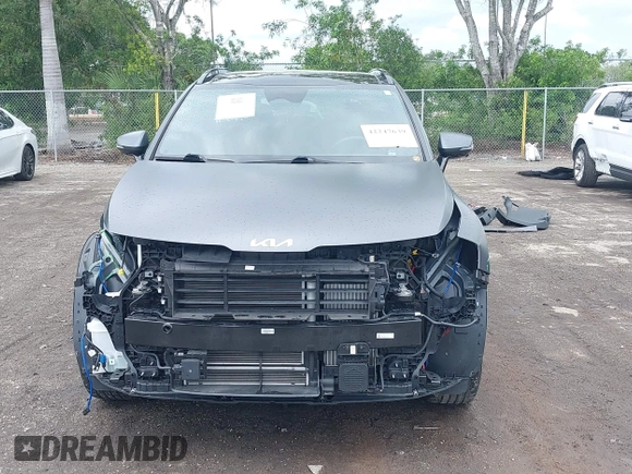 2023 Kia Sportage SX-Prestige with VIN KNDPXCAG7P7071365, listed as a IAAI auction lot 42247639 with 21,509 mi miles and . Bid and sale history available at DreamBid. Image 13.
