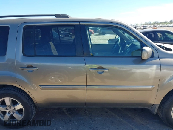 2010 Honda Pilot EX-L z VIN 5FNYF4H56AB001911, wystawiony jako IAAI lot #41806101 z przebiegiem 188 949 mil mil oraz . Historia ofert i sprzedaży dostępna na DreamBid. Obrazek 13.