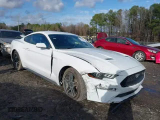 2021 Ford Mustang EcoBoost with VIN 1FA6P8TH6M5105467, listed as a IAAI auction lot 41732934 with 69,287 mi miles. Bid and sale history available at carsss.com. Image 1.