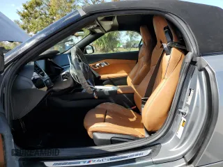 2024 BMW Z4 sDriveM40i with VIN WBAHF9C02RWY35106, listed as a Copart auction lot 76471014 with 0 mi miles and Salvage Title. Bid and sale history available at carsss.com. Image 7.