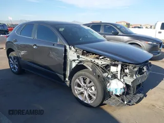 2021 Mazda CX-30 Select with VIN 3MVDMBBL5MM318545, listed as a IAAI auction lot 42011788 with 46,935 mi miles. Bid and sale history available at carsss.com. Image 1.