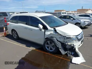 2018 Honda Odyssey EX z VIN 5FNRL6H59JB080113, wystawiony jako IAAI lot #42098215 z przebiegiem 140 721 mil mil oraz . Historia ofert i sprzedaży dostępna na DreamBid. Obrazek 1.