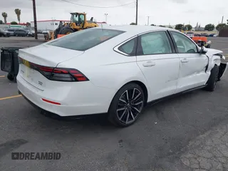 2024 Honda Accord Touring with VIN 1HGCY2F81RA014559, listed as a IAAI auction lot 42036422 with 39,914 mi miles and . Bid and sale history available at DreamBid. Image 4.