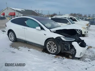 2019 Tesla Model X 75D with VIN 5YJXCDE21KF184361, listed as a IAAI auction lot 41320996 with 72,791 mi miles. Bid and sale history available at carsss.com. Image 1.