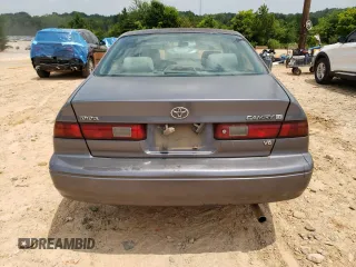1999 Toyota Camry LE z VIN JT2BF22K5X0208248, wystawiony jako Copart lot #59916165 z przebiegiem 329 883 mil mil oraz Szkoda całkowita • Salvage title. Historia ofert i sprzedaży dostępna na DreamBid. Obrazek 6.
