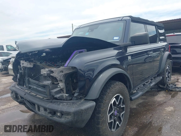 2021 Ford Bronco with VIN 1FMDE5BH2MLA85541, listed as a IAAI auction lot 42376748 with 53,724 mi miles and . Bid and sale history available at DreamBid. Image 2.