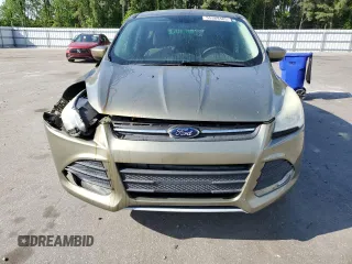 2014 Ford Escape SE z VIN 1FMCU0GX2EUA26924, wystawiony jako Copart lot #55389485 z przebiegiem 102 537 mil mil oraz Szkoda całkowita • Salvage title. Historia ofert i sprzedaży dostępna na DreamBid. Obrazek 5.